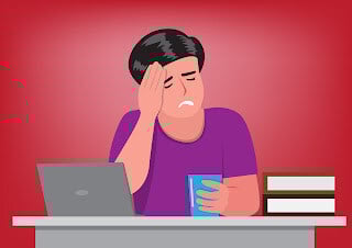 Woman hand on head in pain