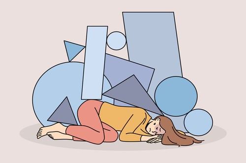 vecteezy_unhappy-stressed-young-woman-immobile-under-life-troubles_13353253